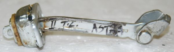 Opel Astra II ogranicznik drzwi TYLNY LEWY