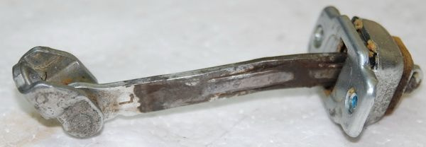 Opel Astra II ogranicznik drzwi TYLNY LEWY