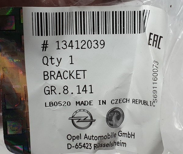Opel Astra V K wspornik błotnika przód prawy 13412039 NOWY