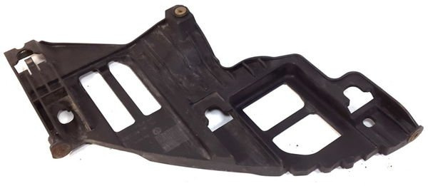 VW Golf V uchwyt slizg lampy prawy 5K0807228