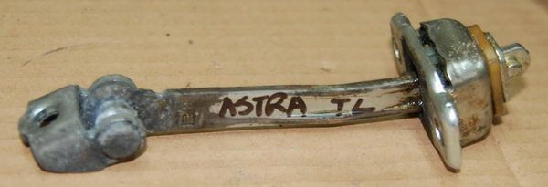 Opel Astra II ogranicznik drzwi TYLNY LEWY