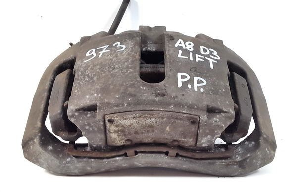 Audi A8 D3 LIFT zacisk przód przedni prawy 973
