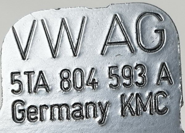VW Caddy Tiguan uchwyt lampy przód lewy 5TA804593A ORG NOWY
