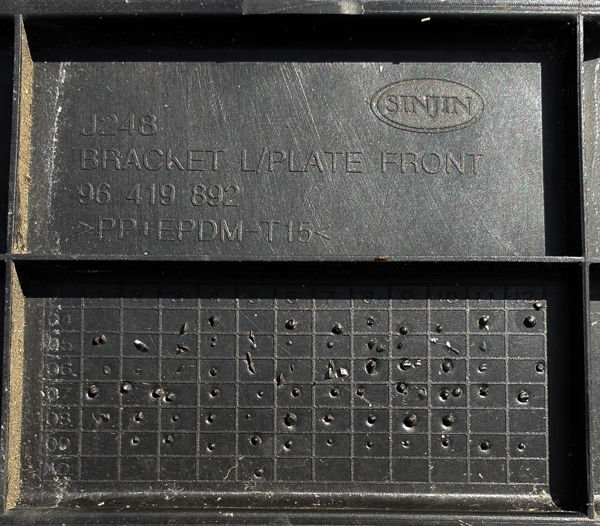 Chevrolet Lacetti podstawa tablicy rejestracyjnej 96419892